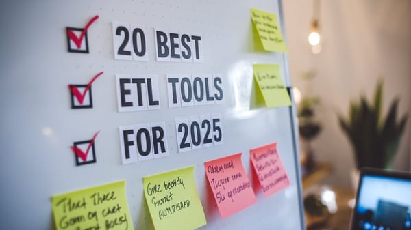 A photo of a whiteboard with the text "20 Best ETL Tools for 2025". There are checkmarks next to a few of the tools.